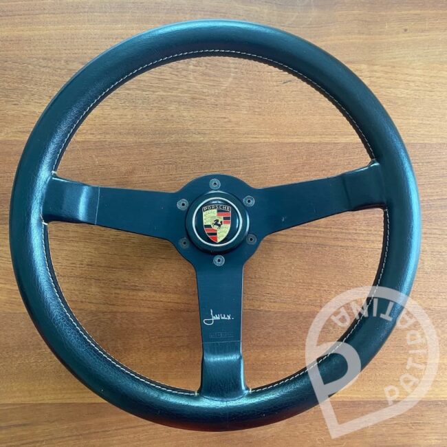 mint black Momo Jacky Ickx steering wheel for sale